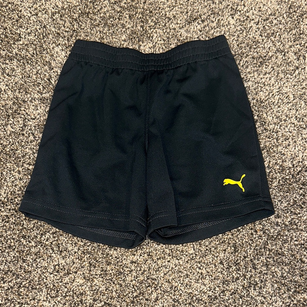 Puma Navy Athletic Shorts with Yellow Emblem